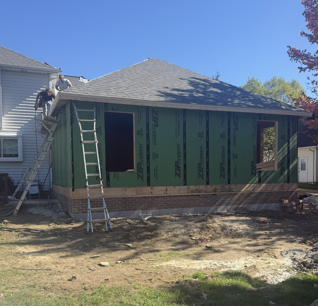 Ward Renovation Solutions addition, Shingles on, windows in