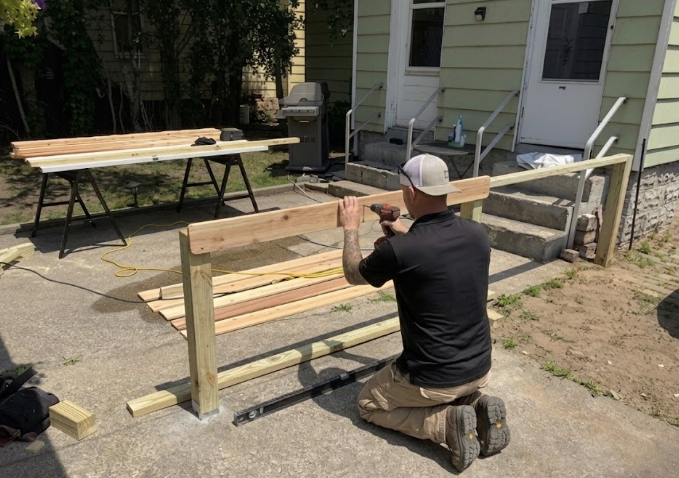 Custom architectural privacy fence build in progress